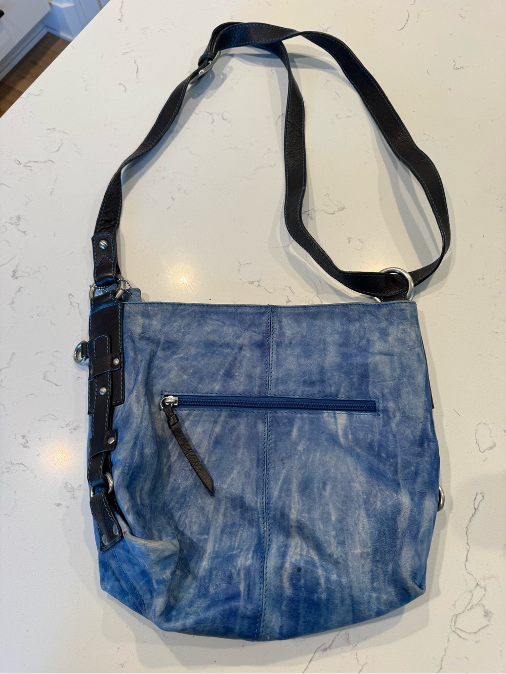 Nino Bossi leather blue purse bag with floral interior